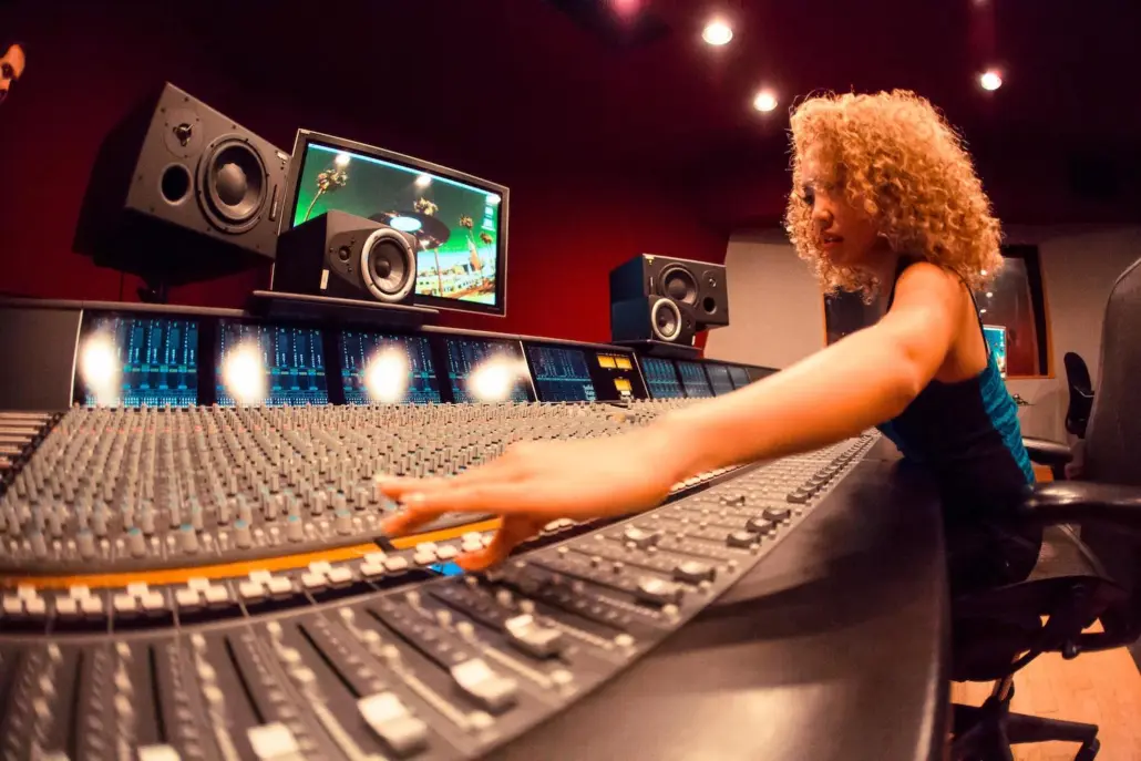 Woman at a recording console