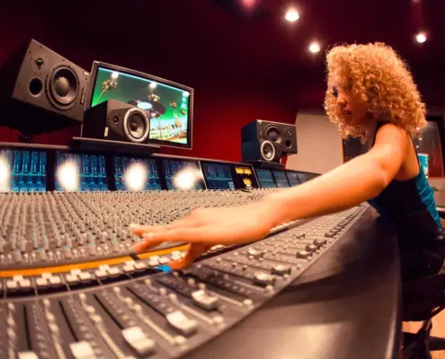 Woman at a recording console