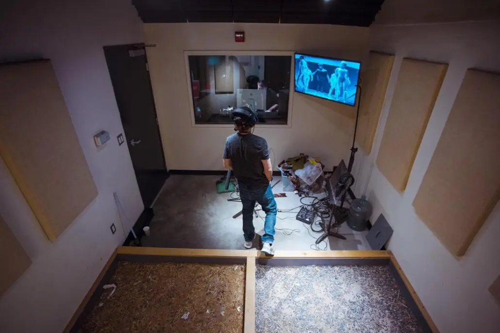 Man looking at screen recording foley