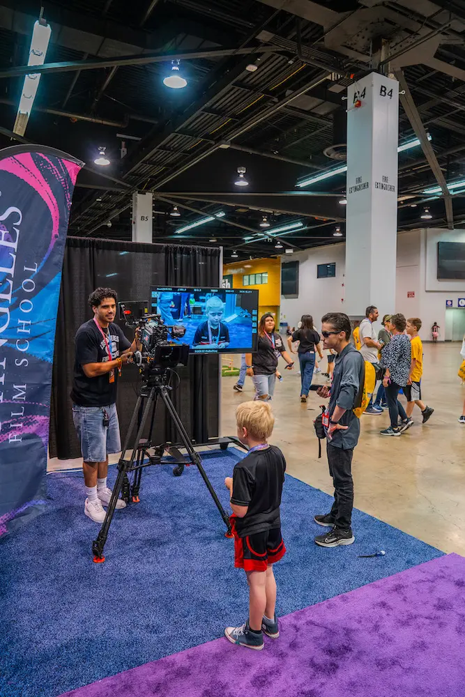 Child on screen and camera at Vidcon