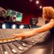 Woman at a recording console