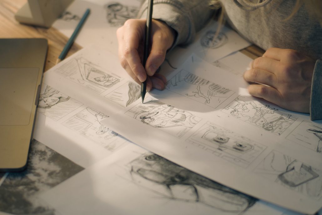 Person handwriting storyboards