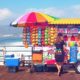 Woman at Booth on Santa Monica Pier