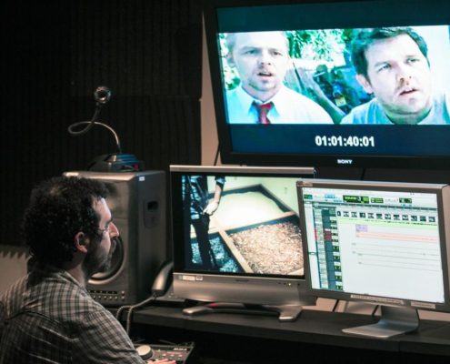 The Art of Foley: How Movie Sounds Are Made: Man Producing Foley in a studio