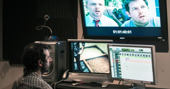 The Art of Foley: How Movie Sounds Are Made: Man Producing Foley in a studio