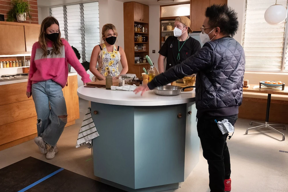 Joshua Bramer on the set of Don't Worry Darling with Olivia Wilde and Florence Pugh
