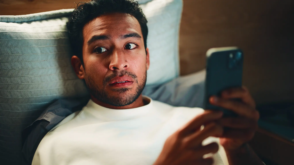 man watching tv alone, second screen