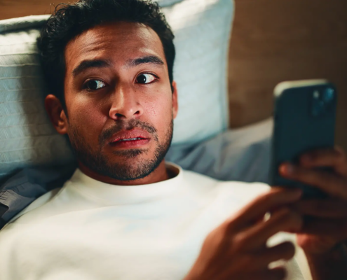 man watching tv alone, second screen